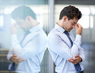 Image showing Headache, tired and business man with stress, burnout and anxiety for financial crisis in office. Frustrated, depression and serious professional with fatigue, sick and fail challenge with mistake