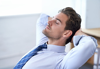 Image showing Businessman, moment and relax breathing in office for stress management, relief and balance for peace while working. Man, calm and eyes closed in workplace for wellness break for corporate work