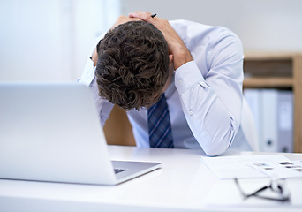 Image showing Businessman, office and laptop with desk, stressed and frustrated with mistake or failure. Person, technology and headache with debt, report or burnout for corporate mental health or depression