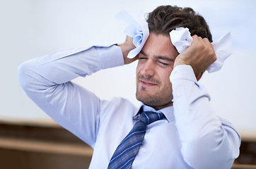 Image showing Businessman, head and stressed with crumpled paper, burnout and mistake for frustration, debt and headache. Angry employee, worker and report for bills, worried and failure with audit or deadline