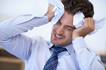 Image showing Businessman, head and stressed with crumpled paper, headache and mistake for frustration, debt and burnout. Angry employee, worker and report for bills, worried and failure with audit or deadline