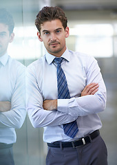 Image showing Businessman, portrait and confident with arms crossed in office for professional career in finance, serious and pride. Entrepreneur, face of employee and relax with break and auditing at workplace