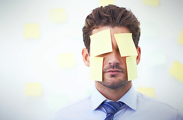 Image showing Businessman, face and sticky note as work reminder or company project deadline, schedule or problem. Male person, stress and post it or wall background with pressure or overwhelmed, memo or planning