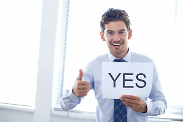 Image showing Businessman, portrait and smile with poster or thumbs up for yes, we are hiring or recruitment support in office. Human resource, employee and face or happy with billboard paper or placard with offer