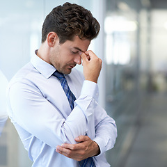 Image showing Headache, fatigue and business man with stress, burnout and anxiety for financial crisis in office. Frustrated, depression and serious professional with pain, sick and fail challenge with mistake