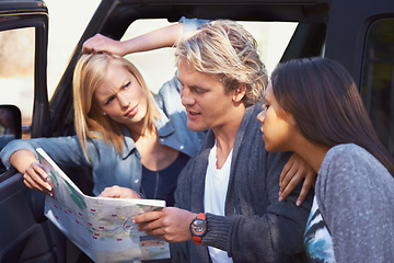 Image showing Group of friends, outdoor and map for adventure, travel and lost with journey and getaway trip. Lost, man and women with paper and searching for a place with conversation and discussion with vehicle
