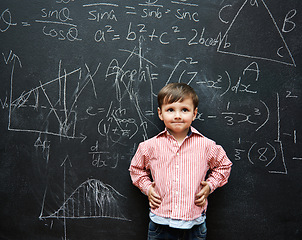 Image showing Smart, child and math on chalkboard for school, learning and education with ideas, thinking or confidence. Genius and clever kid, boy or student with equation, numbers and test for IQ or intelligence
