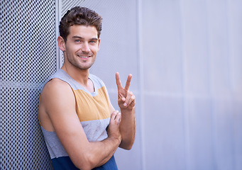Image showing Smile, fashion and portrait of man with peace sign for style, trendy and hand gesture with confidence. Male person, happy and relax with v fingers for emoji, hipster and symbol with clothes on mockup