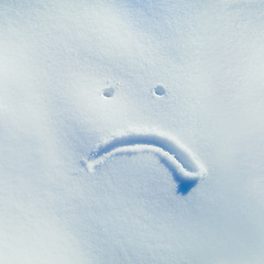 Image showing Sad, snow and drawing in ice outdoor on ground in winter for communication on social media. Writing, sign and frown depressed emoji on field in nature with frozen background and written sketch