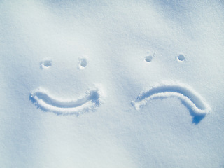 Image showing Emoji, face and drawing in snow or outdoor on ground in winter for communication or feedback. Writing, sign and smiley in ice on field in nature with frozen background and written sketch review