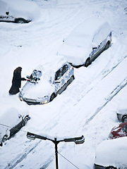 Image showing Person, cars and road with winter snowstorm or nature environment in Vancouver, cold weather or transportation. Travel, vehicle and frozen or ice on town street for climate season, outdoor or frost