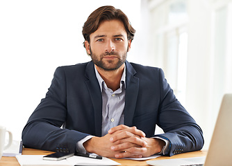 Image showing Desk, laptop and portrait of businessman with pride, paperwork and serious financial analyst in office. Consultant, business advisor or man with computer, documents and research notes at startup.