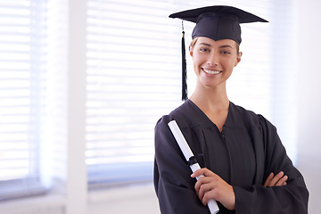 Image showing Graduate, diploma and portrait of happy woman with arms crossed at university. Face, graduation and confident student with certificate for education achievement, success and scholarship in Canada