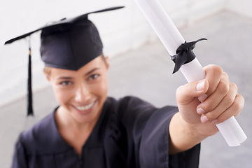 Image showing Graduate, certificate and portrait of happy woman in celebration for success at college. Face, graduation or hand of student with diploma for education, achievement or closeup of degree in university