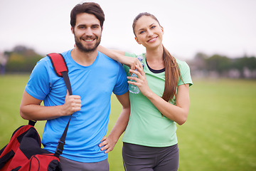 Image showing Fitness, couple in portrait outdoor and workout on field, happy and healthy with partner, physical activity and support. People smile for wellness, exercise together in park and training for bonding