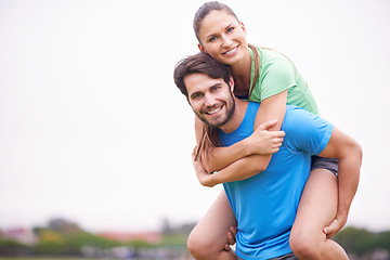 Image showing Exercise, couple and piggyback outdoor for workout break, happy and healthy with strength and endurance. People smile for wellness, fitness together in park with sports or training for bonding