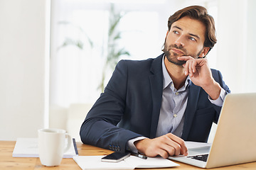 Image showing Desk, laptop and businessman with vision, thinking and research notes for financial analyst in office. Consultant, business advisor or professional man ideas for report, email and planning proposal.