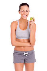 Image showing Health, apple and portrait of woman in studio with snack for weight loss, fitness and wellness diet. Smile, vitamins and female person eating organic, fresh and nutrition fruit by white background.