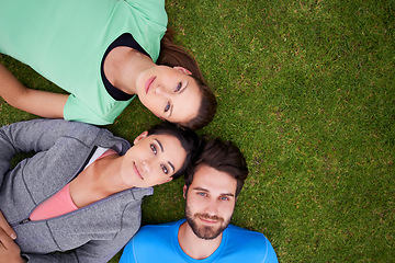 Image showing Top view, group of people on grass and portrait for fitness, relax after workout for health and wellness together. Exercise, training club for sports and active in nature, support and trust outdoor