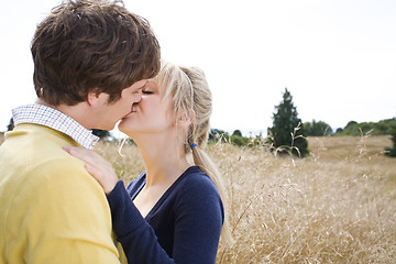 Image showing Young caucasian couple kissing