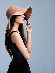 Image showing Fashion, profile and woman in hat with glamour, confidence and mockup in studio. Classic, vintage chic and elegant style with girl on grey background for designer clothes, classy and cool aesthetic.