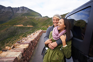 Image showing Happy couple, hug and road trip with love for bonding, holiday or weekend together by car in nature. Young man and woman with smile enjoying romance in support, trust for outdoor vacation by vehicle