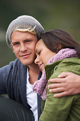 Image showing Happy couple, portrait and hug in relax with love for bonding, holiday or weekend together in nature. Young man and woman smile for embrace, support or care in trust or enjoying outdoor vacation