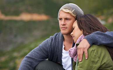 Image showing Couple, hug and relax with love for bonding, holiday or weekend together in peaceful nature. Calm young man and woman resting head on shoulder for embrace, support or care in trust or outdoor romance