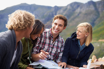 Image showing Happy people, friends and map in nature for travel, location or discussion on destination. Young group with smile, document or paper of outdoor routes, paths or planning road trip or next stop