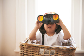 Image showing Child, binocular and hat for game of creativity, adventure or expedition in toy basket at home. Fun, curious and confident kid for spy, pirate or explorer searching for magical, treasure or island