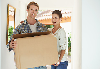 Image showing New home, portrait or happy couple with box for moving or excited for investment in real estate. Man, woman and proud homeowner with package by front door and smile face in living room for mortgage