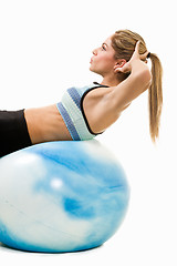 Image showing Woman doing sit ups