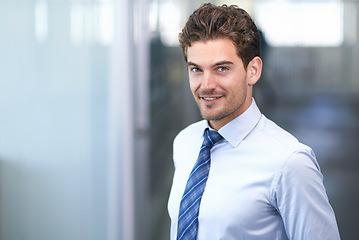 Image showing Entrepreneur, man and smile at office with confidence, happy and satisfied with company growth and progress. Businessman, business development and startup with commitment for career and opportunity.