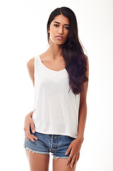 Image showing Fashion, portrait and confidence with Indian woman, stylish clothes and model isolated on a white studio background. Face, person and girl with streetwear and casual outfit with beauty and trendy