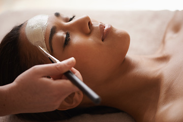 Image showing Beauty, clay and woman with face mask at spa for glow, wellness and skincare routine with self care. Cosmetic, pamper and female person relaxing for natural facial dermatology treatment at salon.