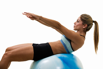 Image showing Woman doing sit ups