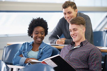 Image showing Student, studying and friends in a classroom with learning, education and university with smile. Book, college and test with notebook, lecture and group with diversity and young people at school