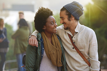 Image showing Students, university and love of interracial couple on campus with hug and embrace together outdoor. College, school education and diversity with a happy smile ready for class study with support