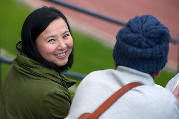 Image showing Back view, Asian woman and university student outdoor, smile and sitting with friend to relax, chill and think. College, campus and share information to study with tips and notes for education