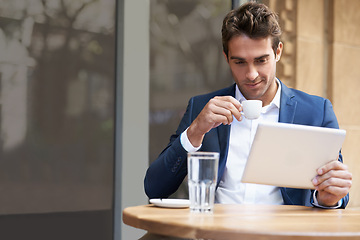 Image showing Businessman, tablet and coffee at outdoor cafe for online research or communication, internet or social media. Male person, espresso and city restaurant in Italy for work trip, networking or email