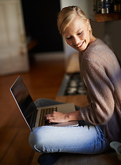 Image showing Remote work, laptop and happy woman in a house for research, planning or web communication. Freelance, smile and female person in living room with social media, blog or copywriting, project or task