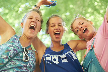 Image showing Excited, friends and group of women in nature on holiday, festival and celebrate weekend outdoors. Happy, scream and people embrace for bonding, fun and relax together on adventure, travel and trip