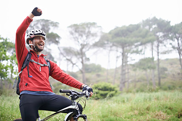 Image showing Fitness, winner and man cycling in countryside for adventure, discovery or off road sports hobby. Exercise, success and celebration with young cyclist on bike in nature for cardio training or workout