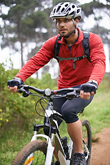 Image showing Fitness, mountain bike and man cycling in countryside for adventure, discovery or off road sports hobby. Exercise, health and young cyclist with helmet on bicycle in nature for training or workout