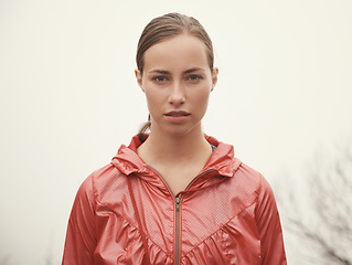 Image showing Woman, portrait and fitness outdoor with fog for hiking, exercise and workout in nature with confidence. Athlete, person and face with pride for running, training and sportswear for healthy body