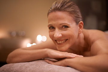 Image showing Portrait, massage and relax with woman, smile and luxury with wellness and spa with skincare. Face, candles and mature person with peace and zen with treatment and vacation with self care and detox