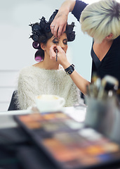 Image showing Women, mirror and makeup at hair salon with beauty for cosmetics, skincare and cosmetology with wellness. Model, people and hairdresser or beautician with client for product application and haircare