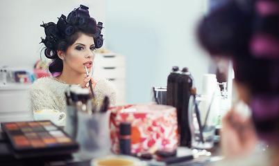 Image showing Woman, face and hair curlers or lipstick for beauty in mirror with haircare, self care or cosmetology. Model, person or hairstyle for morning routine, makeup or getting ready for wellness or grooming