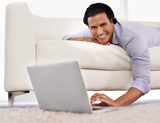 Image showing Remote work, laptop or portrait of businessman on sofa streaming, video or social media at home. Pc, search or freelancer in living room with online tutorial for elearning, upskill or training course