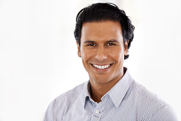 Image showing Portrait, smile and business man in studio isolated on a white background for career of employee in Brazil. Face, happy professional and confident entrepreneur, salesman and agent working for job